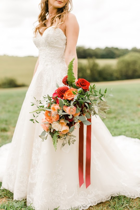 Red and Orange Wedding Bouquet: Nashville wedding planner Amy & I Designs featured on Nashville Bride Guide