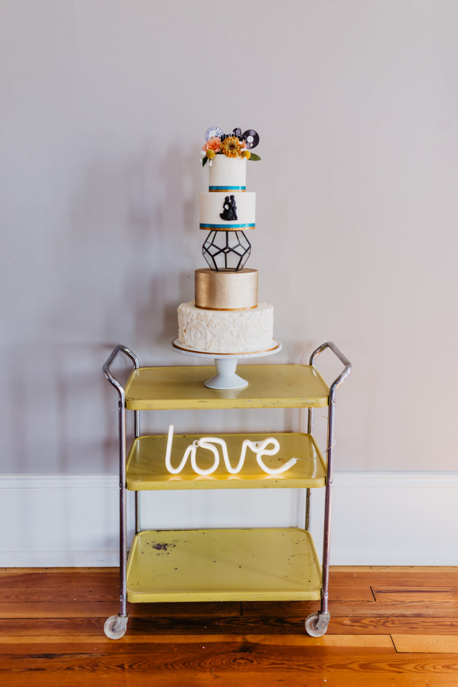 Wedding cake stand: Music City Merger Styled Shoot featured on Nashville Bride Guide