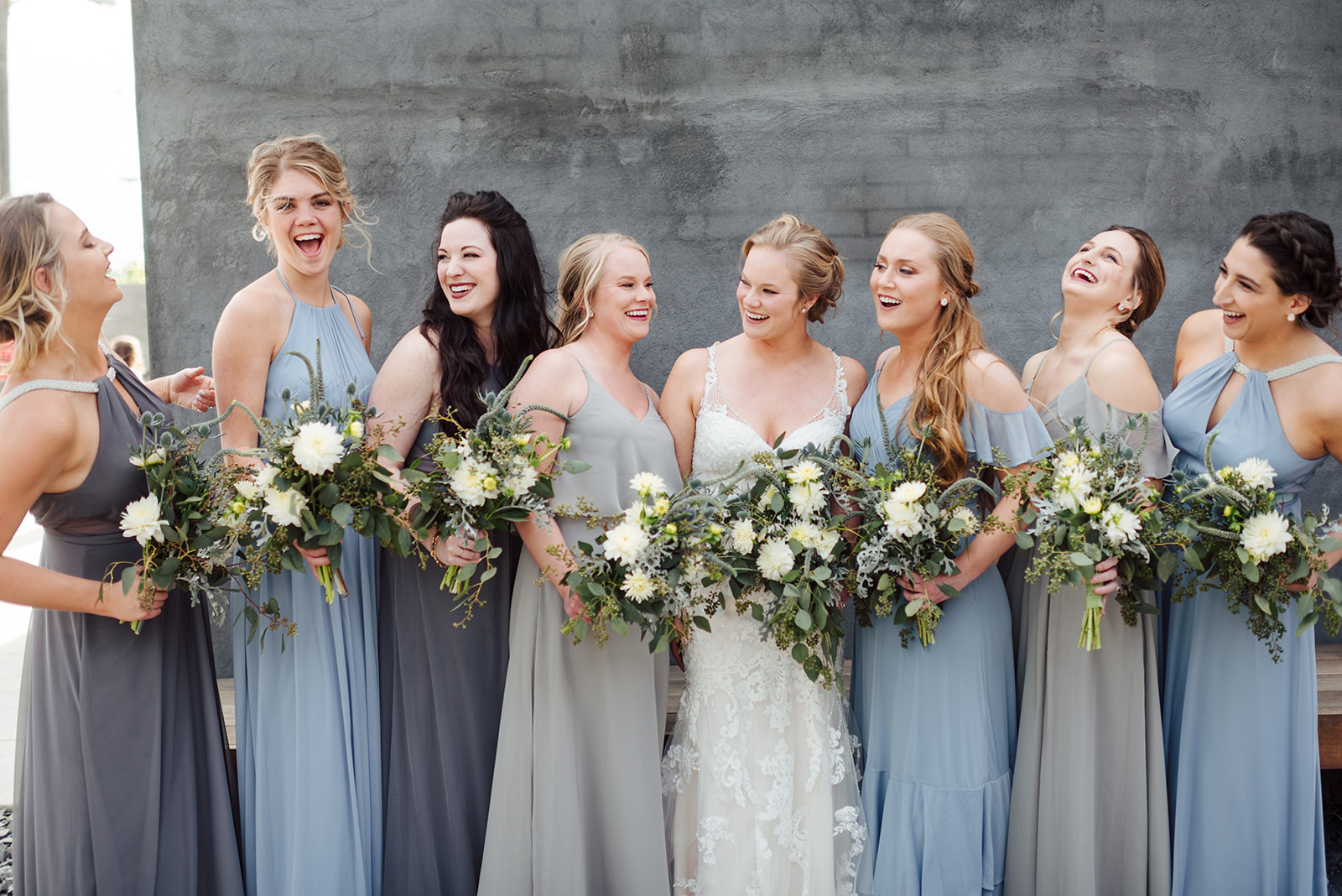 Mismatched blue and gray bridesmaid dresses: Nashville wedding at Clementine featured on Nashville Bride Guide