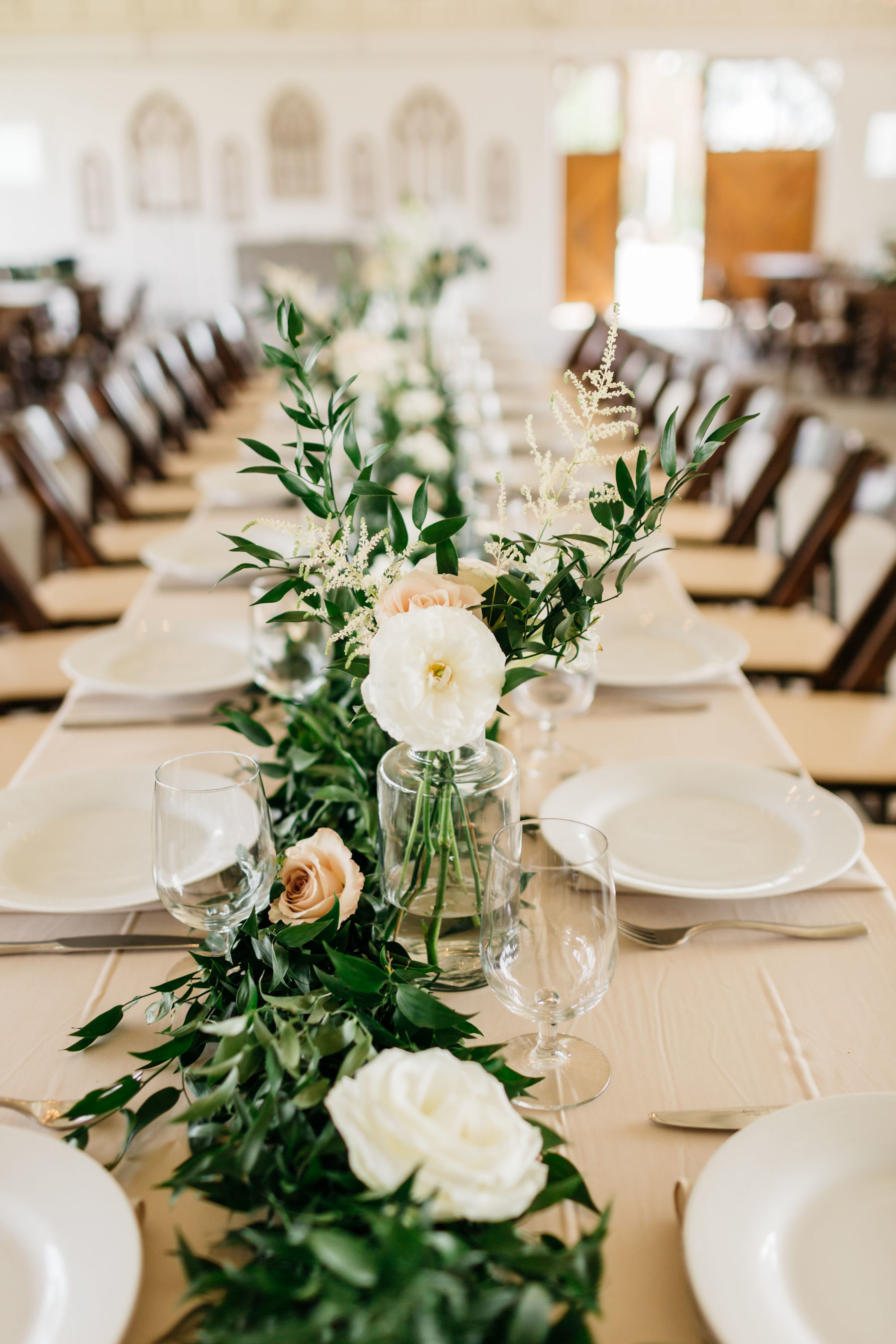 Greenery wedding centerpieces: Rustic Front Porch Farms wedding featured on Nashville Bride Guide