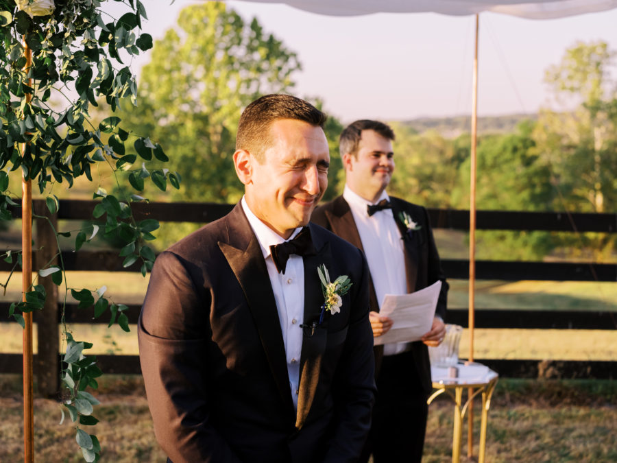 Grooms reaction during wedding ceremony at Autumn Crest Farm