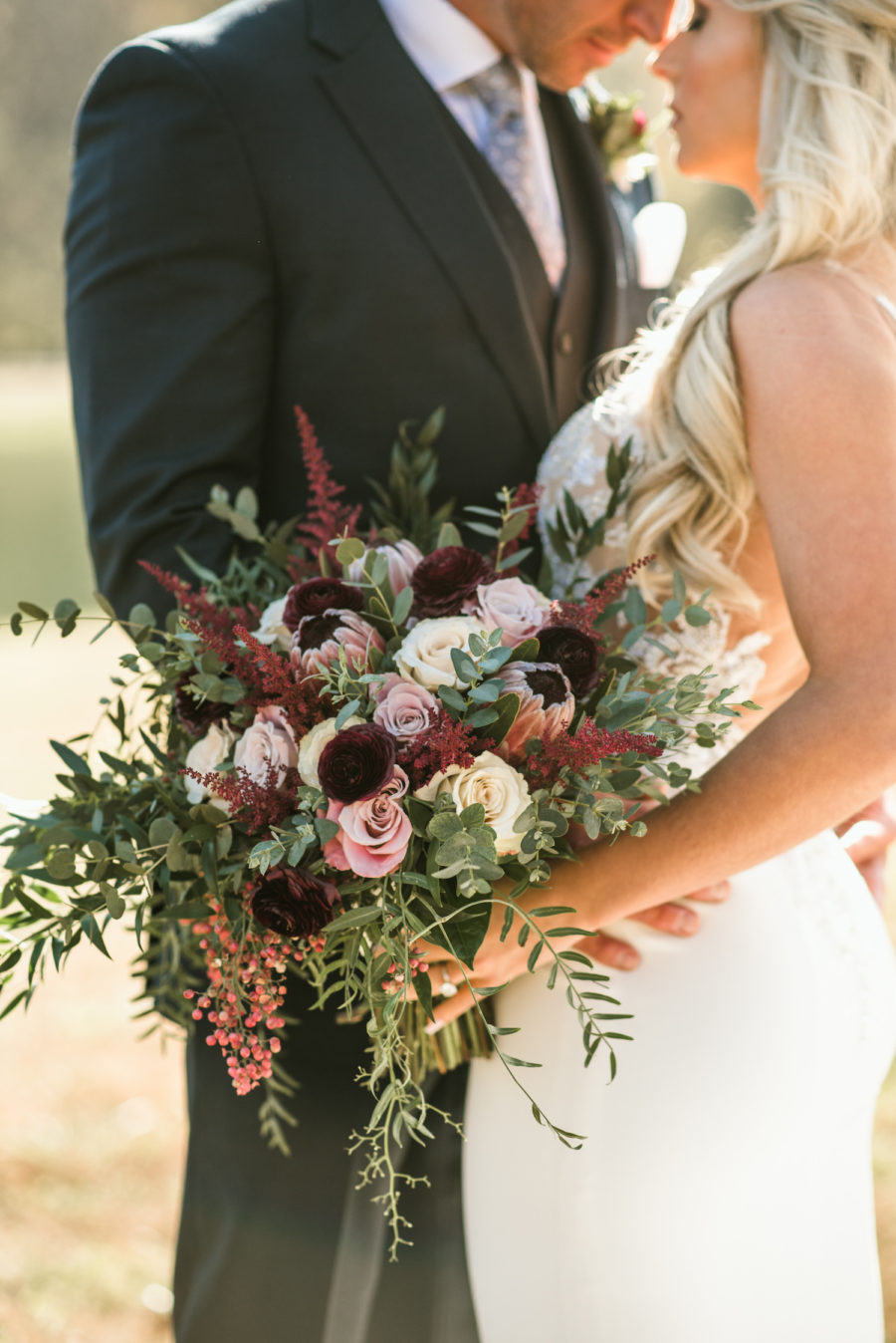 Burgundy and White Wedding Bouquet: Upscale Marble Graystone Quarry Wedding featured on Nashville Bride Guide