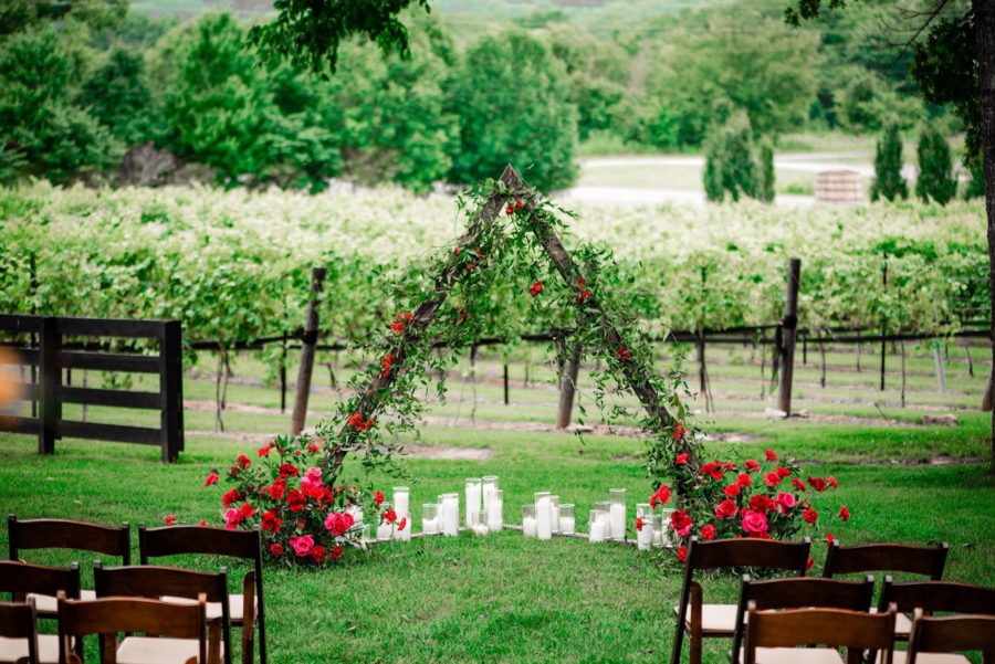 Styled Wedding at Arrington Vineyards in Arrington, Tennessee featuring cherry red and teal color palatte