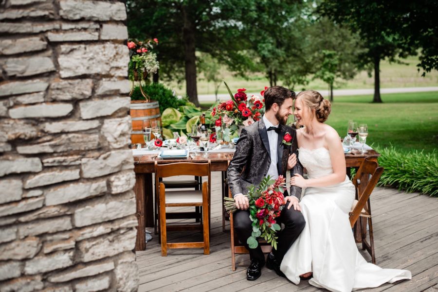 Styled Wedding at Arrington Vineyards in Arrington, Tennessee featuring cherry red and teal color palatte