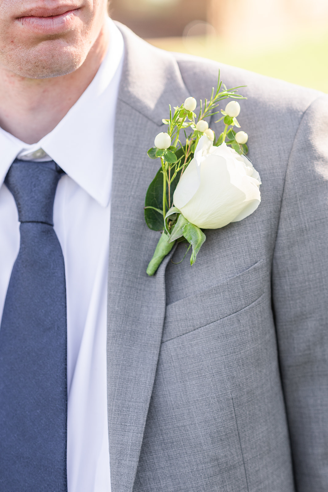 White wedding boutonniere: Timeless Fall Wedding at The Barn at Sycamore Farms