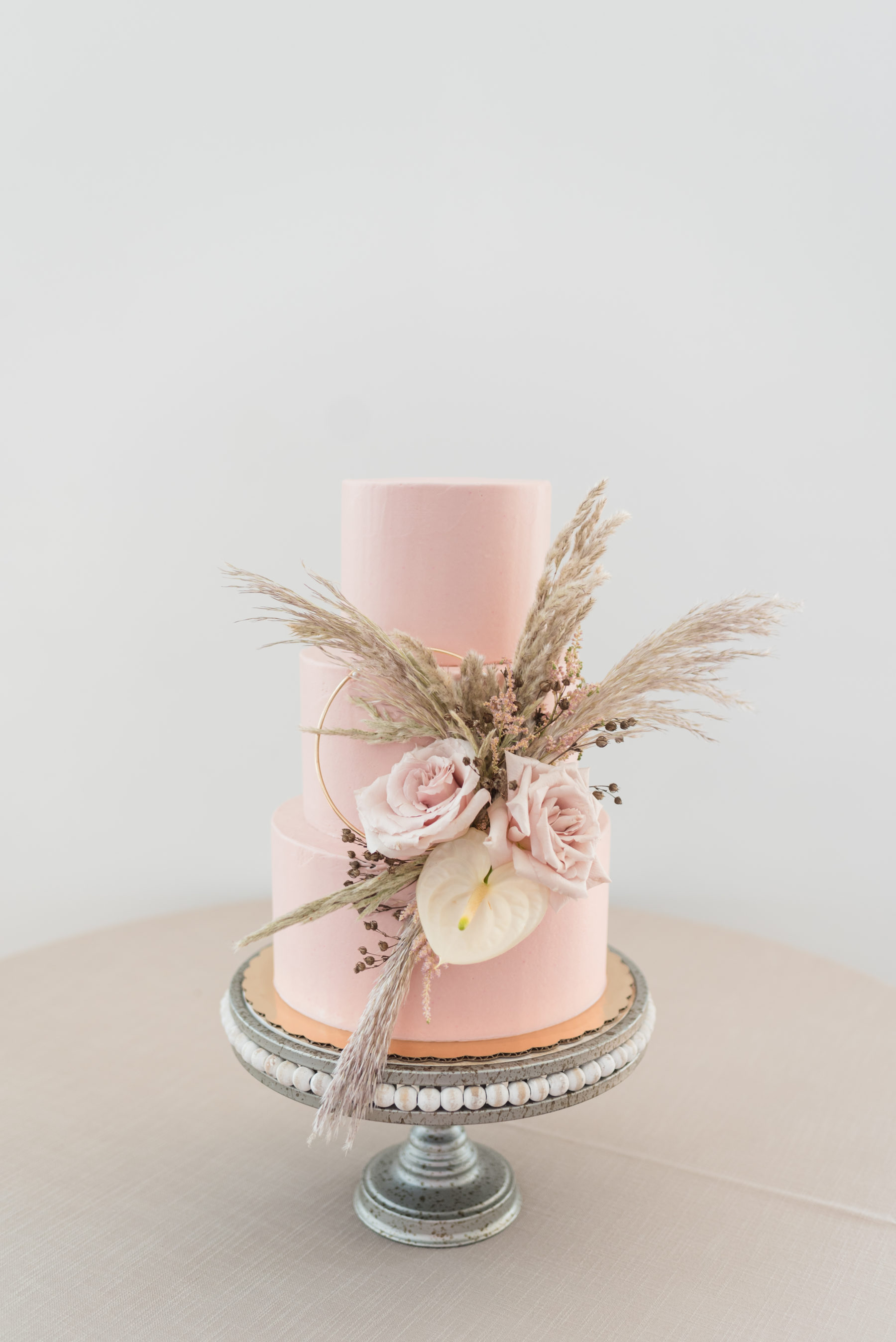 Pink Wedding Cake with Pampas Grass: Organic Eco-Friendly Wedding Styled Shoot featured on Nashville Bride Guide