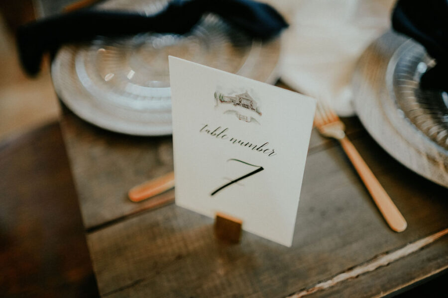 Black and white wedding table number: Boho Barn Wedding by Melissa Marie Floral Designs