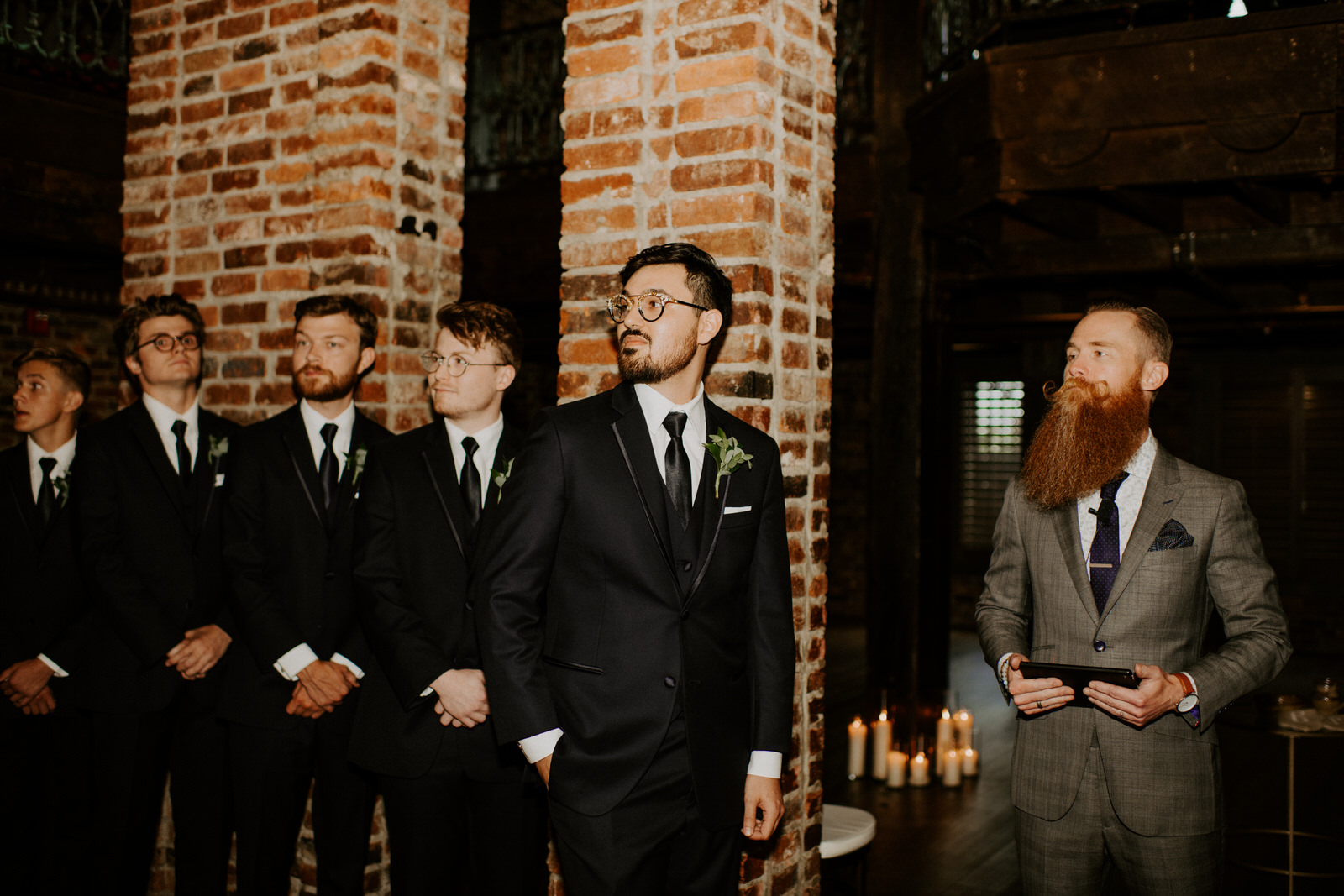 Groom looking at bride coming down the aisle: Romantic Nashville Wedding at The Bedford featured on Nashville Bride Guide