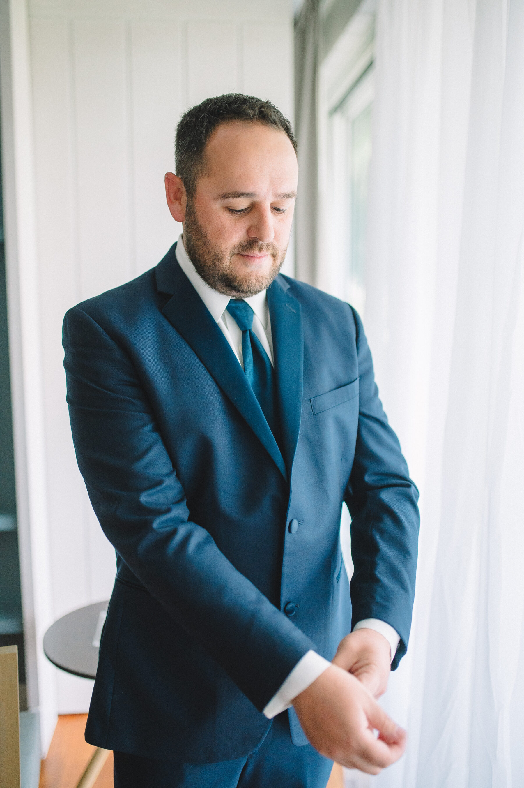 Navy blue groom's attire: Intimate Caribbean Wedding by Details Nashville featured on Nashville Bride Guide