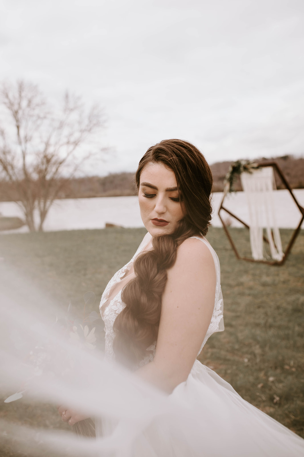 Long braided wedding hair: Surprise Vow Renewal by Tara Winstead Photography featured on Nashville Bride Guide