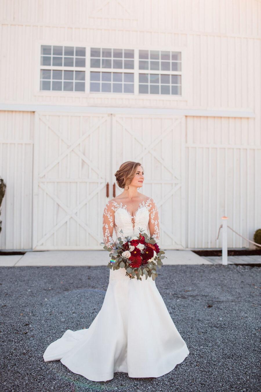Bridal Portrait with Red Wedding Bouquet: Intimate Barn Wedding from John Myers Photography