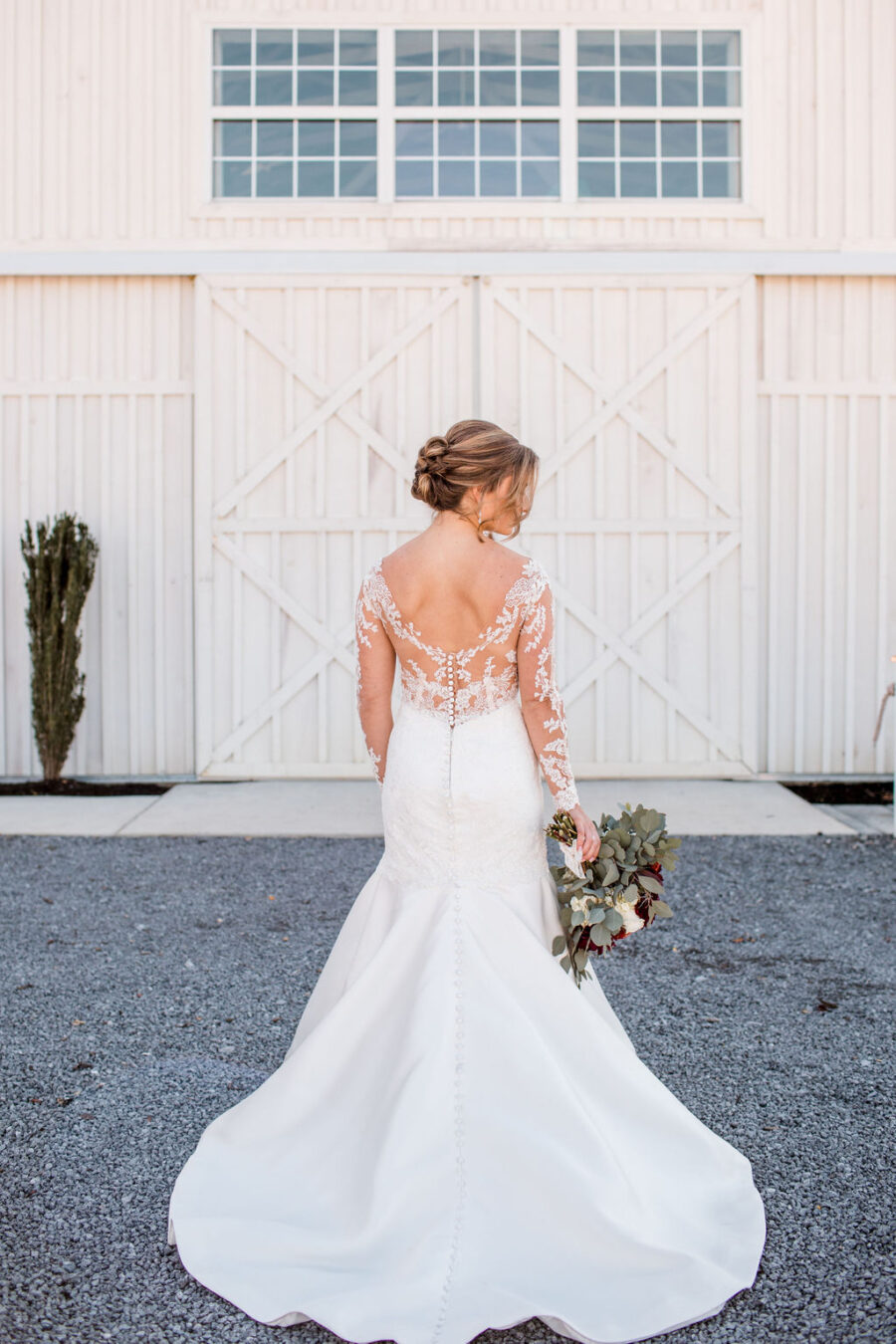 Lace long sleeve wedding dress: Intimate Barn Wedding from John Myers Photography