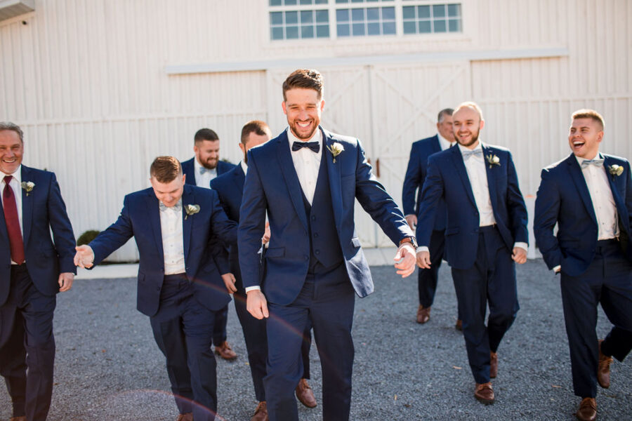 Grooms and groomsmen photo: Intimate Barn Wedding from John Myers Photography