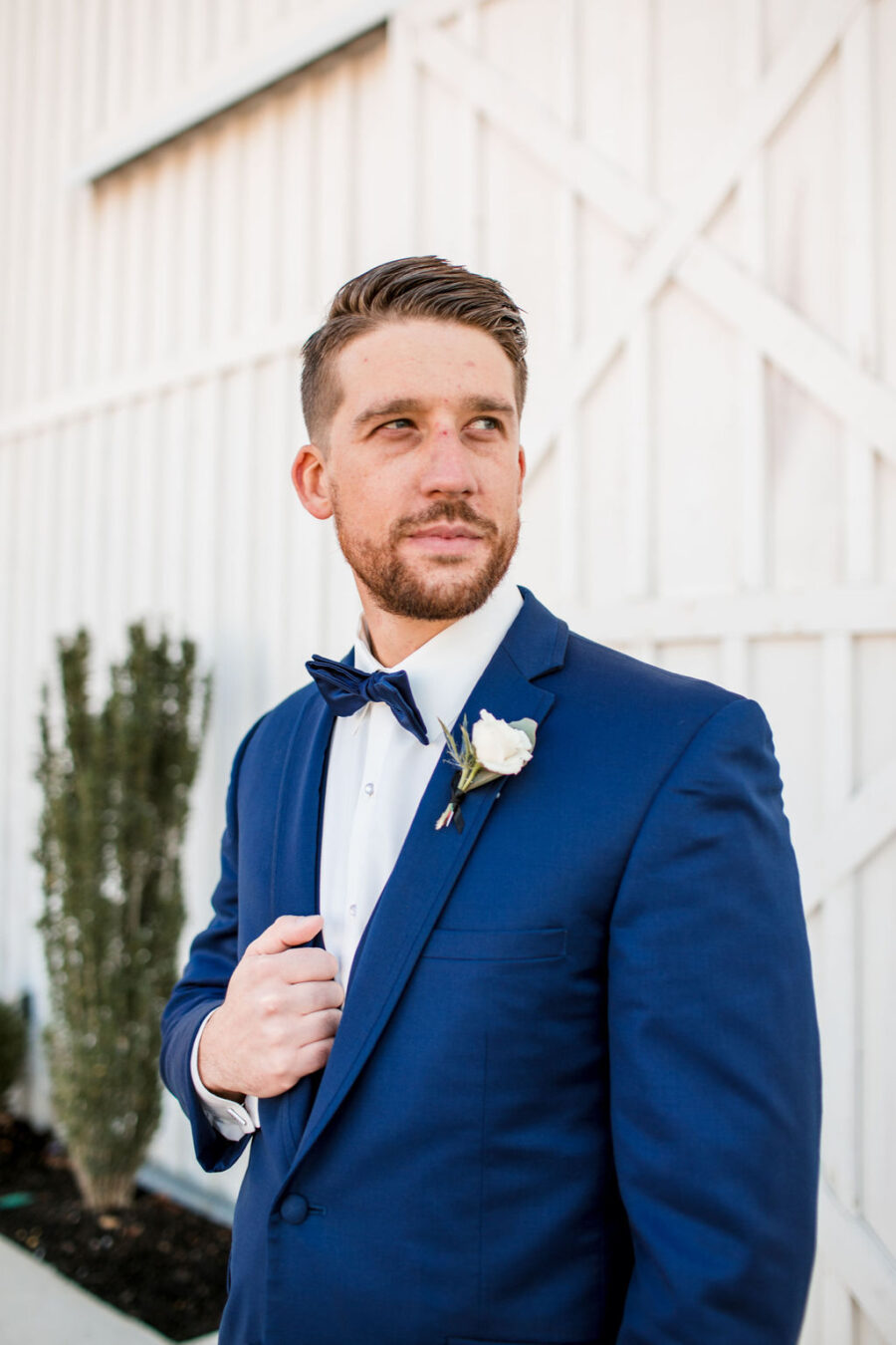 Grooms portrait: Intimate Barn Wedding from John Myers Photography