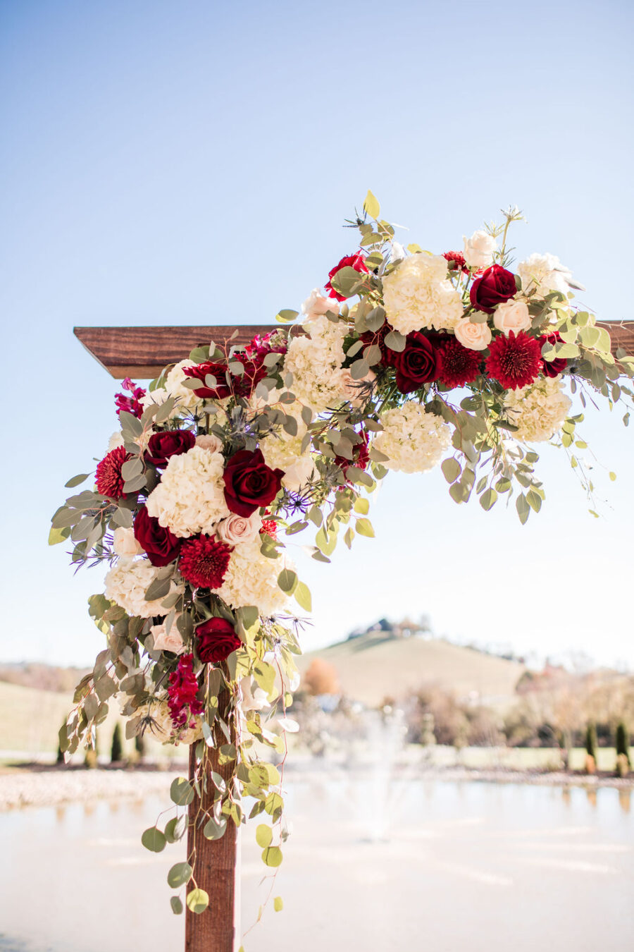 Wedding ceremony flowers: Intimate Barn Wedding from John Myers Photography