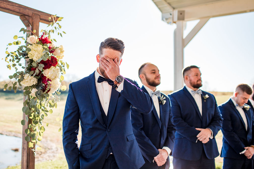 Grooms reaction to bride walking down the aisle: Intimate Barn Wedding from John Myers Photography