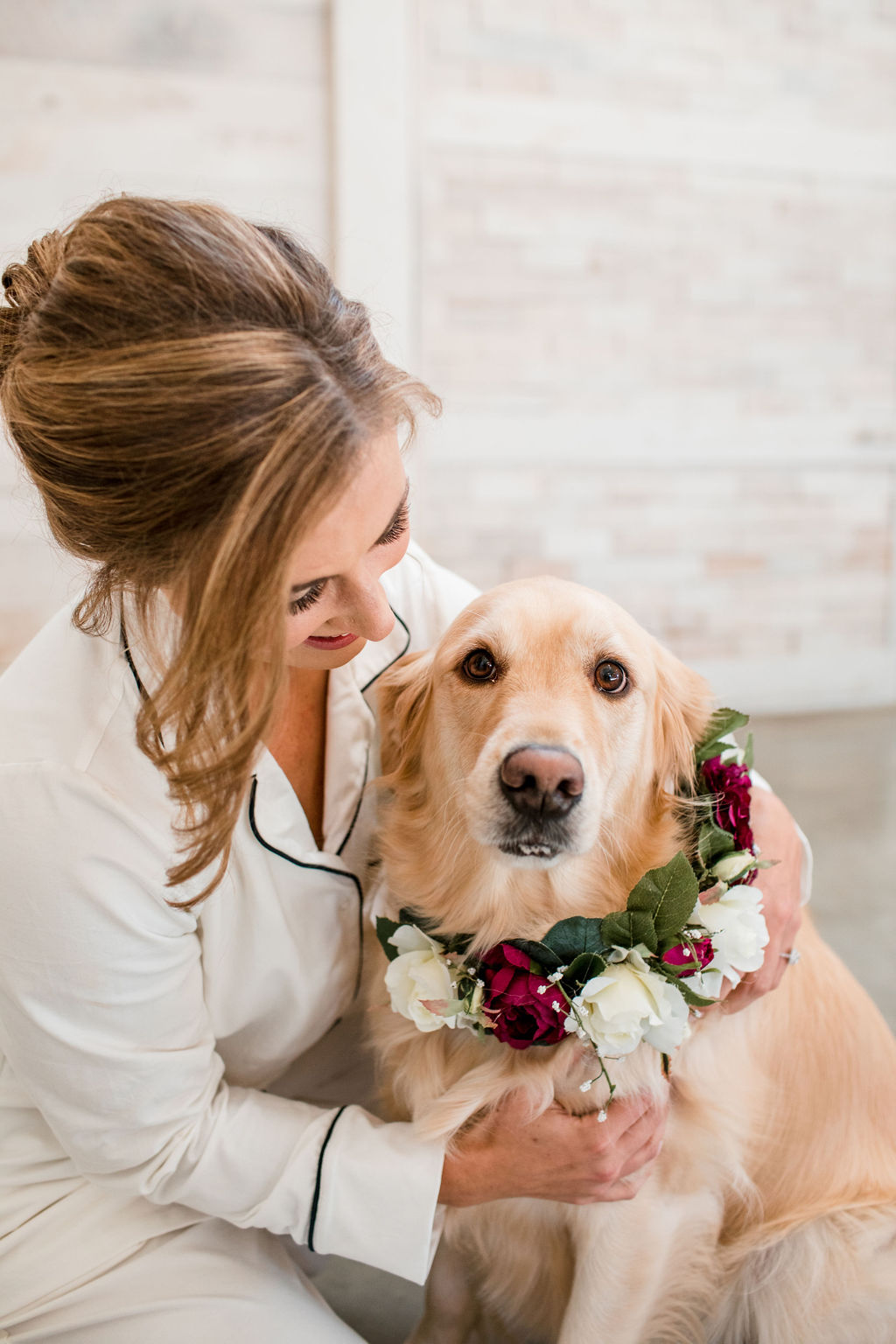 Bride posing with dog: Intimate Barn Wedding from John Myers Photography