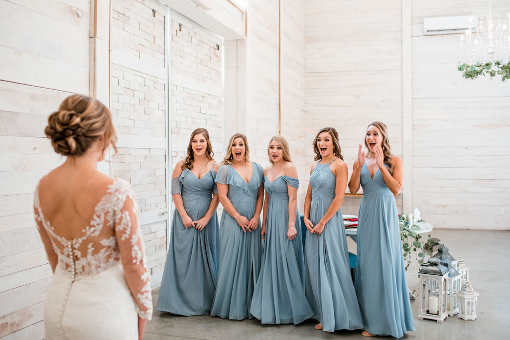 Dusty Blue Bridesmaid Dresses during Bridal First Look: Intimate Barn Wedding from John Myers Photography