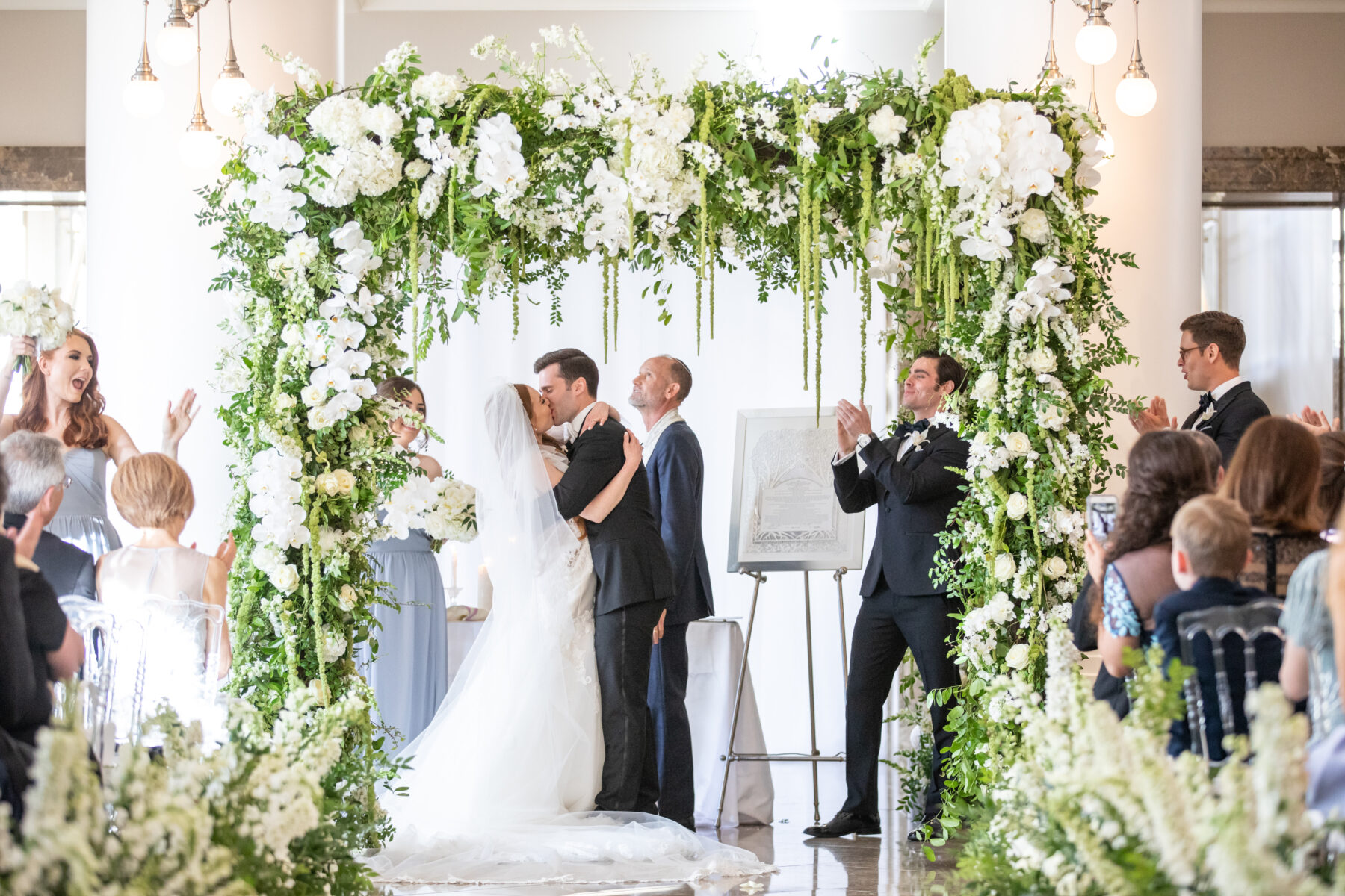 Floral ceremony arch: Floral Filled Luxurious Wedding by LMA Designs featured on Nashville Bride Guide