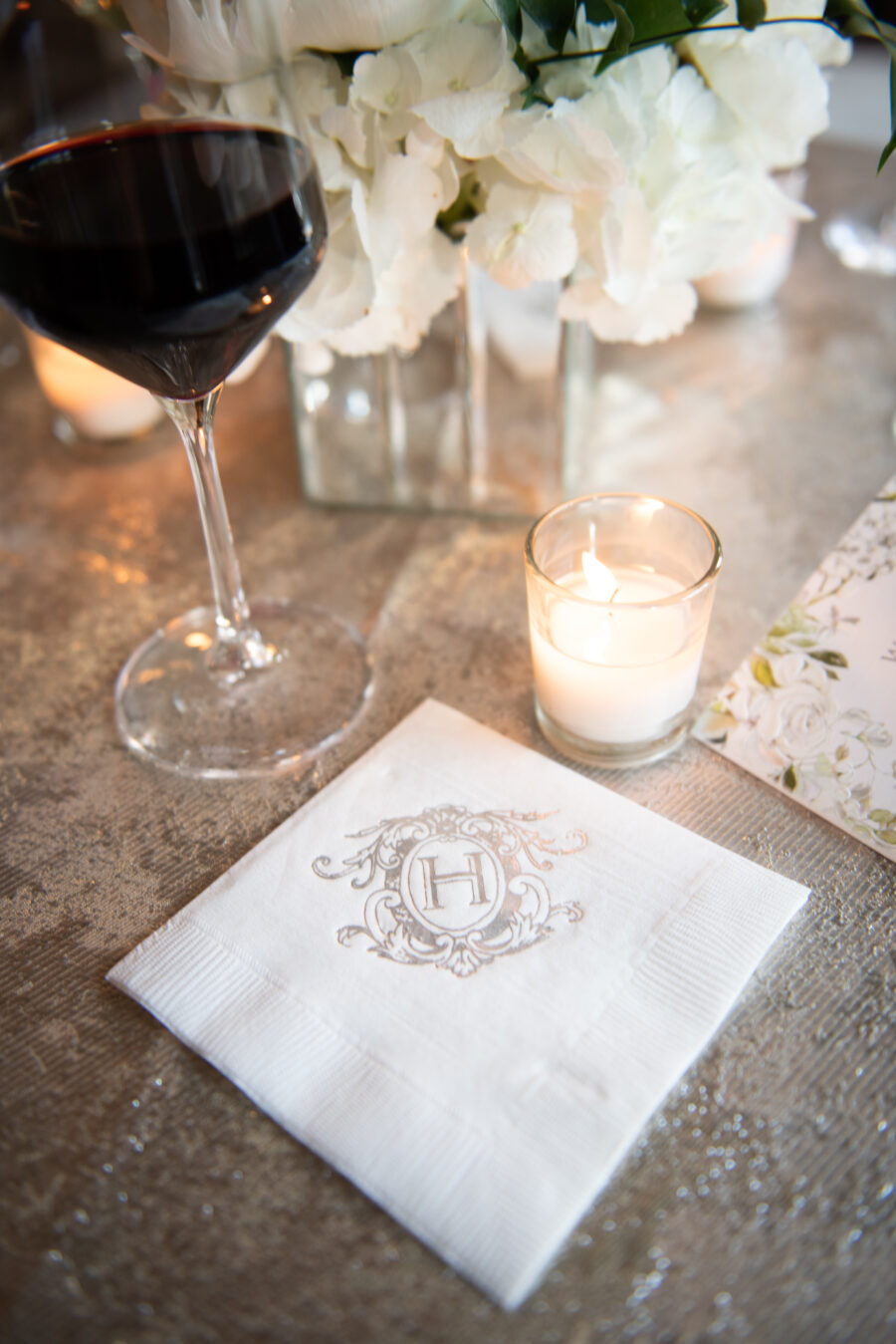 Custom cocktail hour napkins: Floral Filled Luxurious Wedding by LMA Designs featured on Nashville Bride Guide