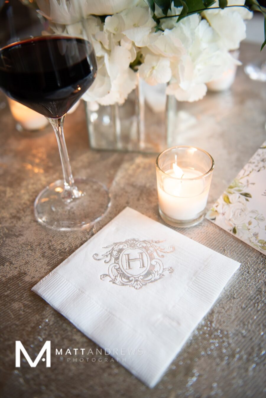 Custom cocktail hour napkins: Floral Filled Luxurious Wedding by LMA Designs featured on Nashville Bride Guide
