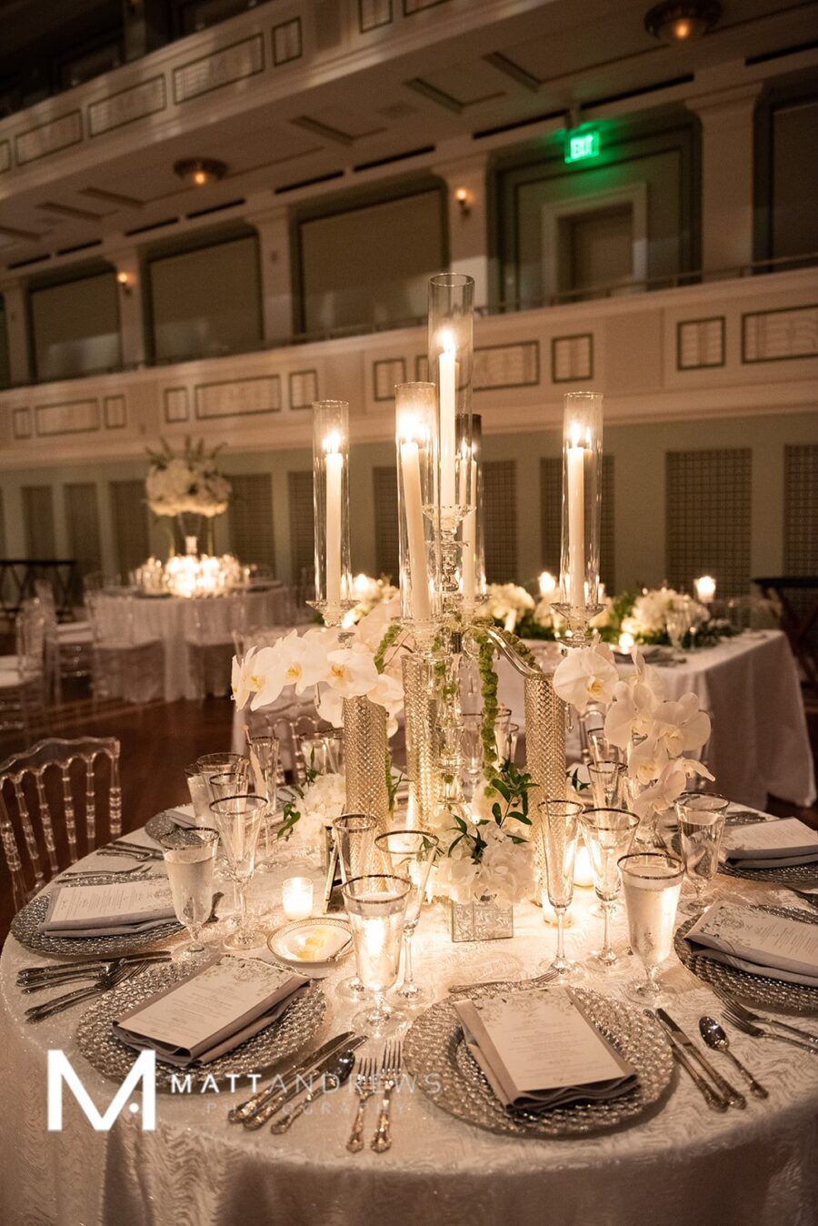 Elevated candlelight wedding centerpieces: Floral Filled Luxurious Wedding by LMA Designs featured on Nashville Bride Guide