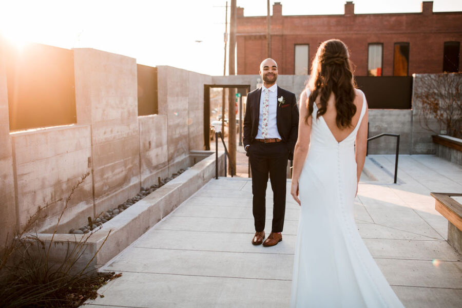 Bride and groom first look: Burgundy and Navy Wedding at Clementine Hall