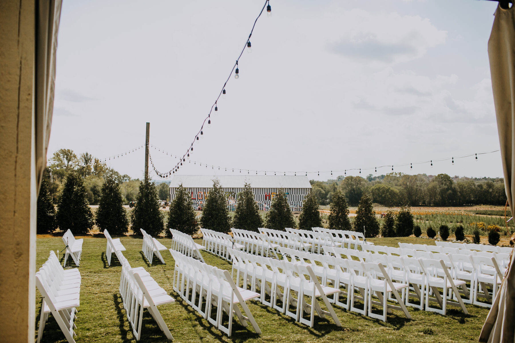 Outdoor wedding ceremony: Nashville Wedding with Beautiful Views by Teale Photography featured on Nashville Bride Guide