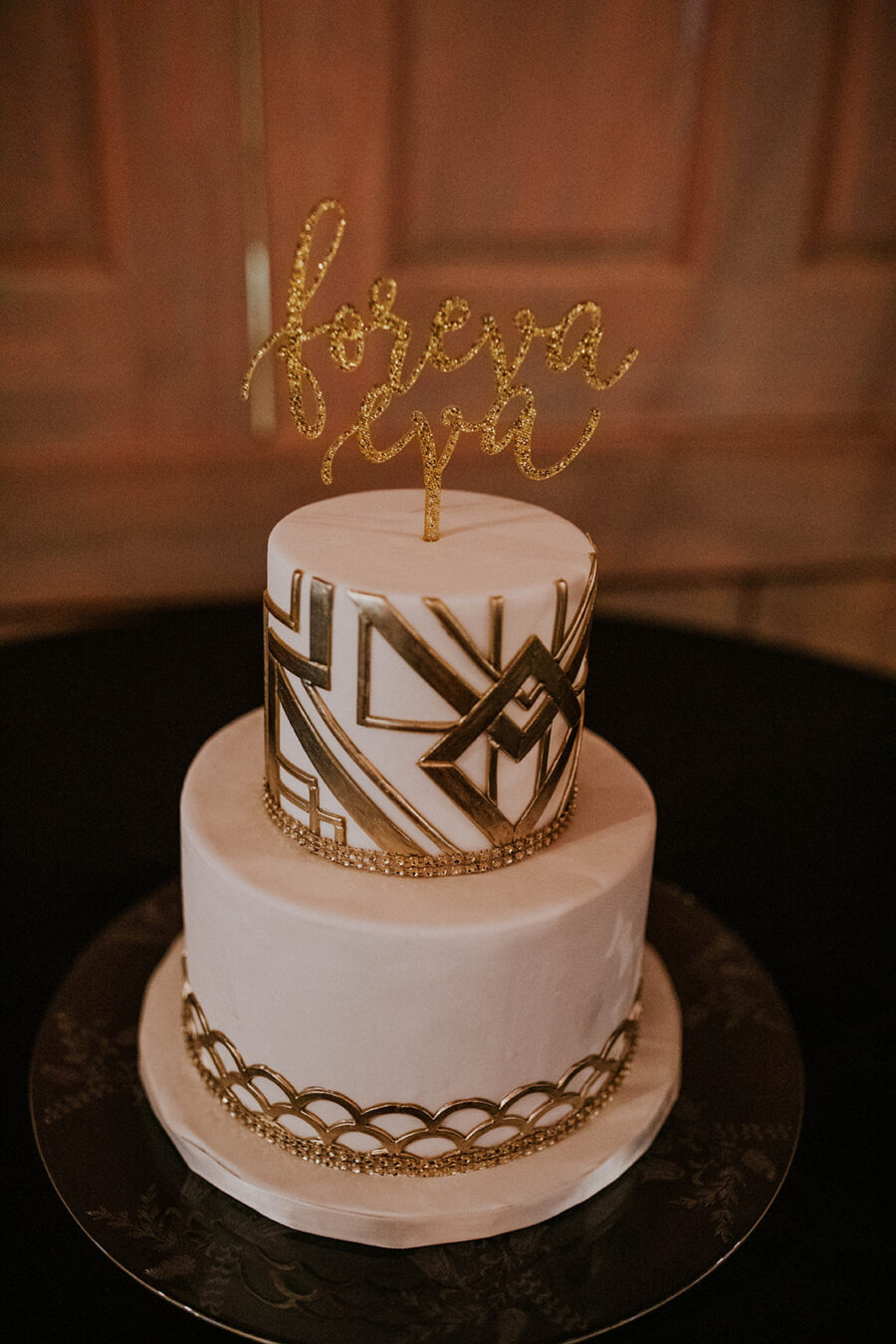 White and gold art deco wedding cake