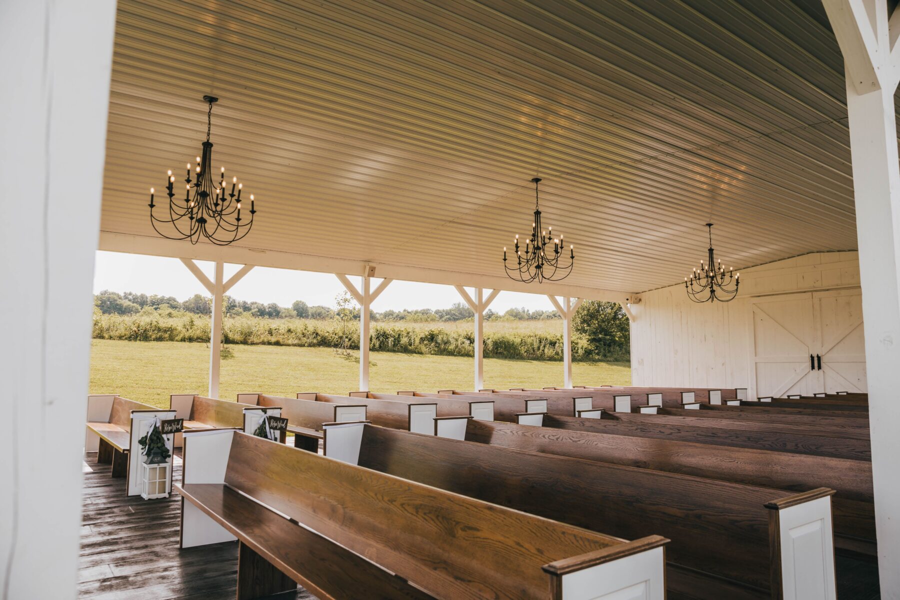 Semi-outdoor wedding ceremony decor: White Dove Barn Wedding by Grace Upon Grace Photography featured on Nashville Bride Guide