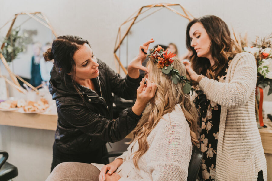 Bride getting wedding hair and makeup done
