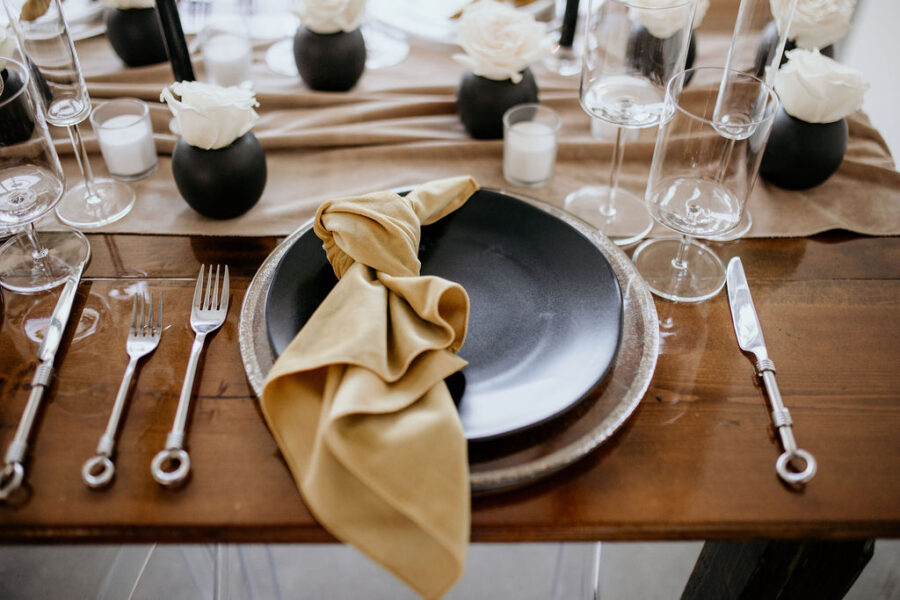 Black and gold wedding table decor