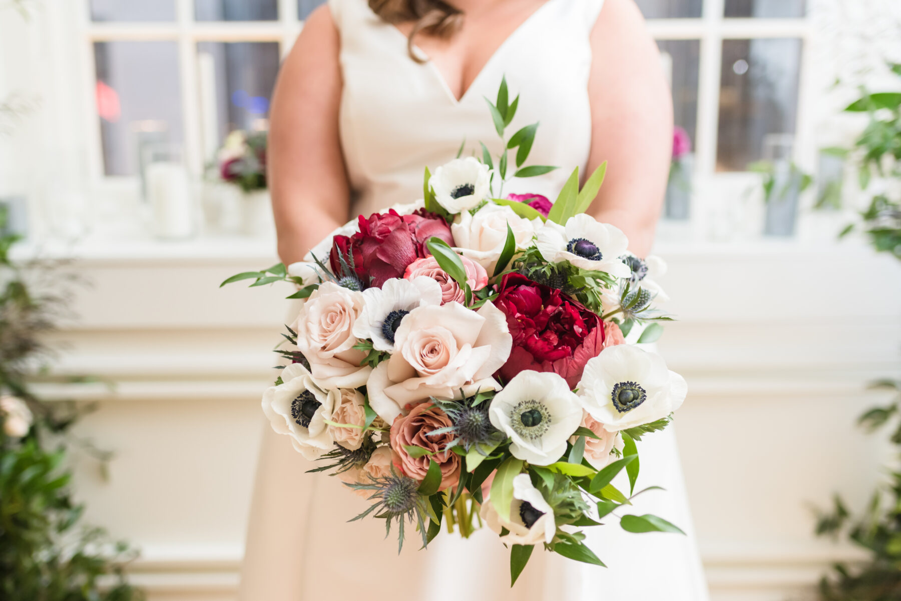 Red, pink, and white wedding bouquet