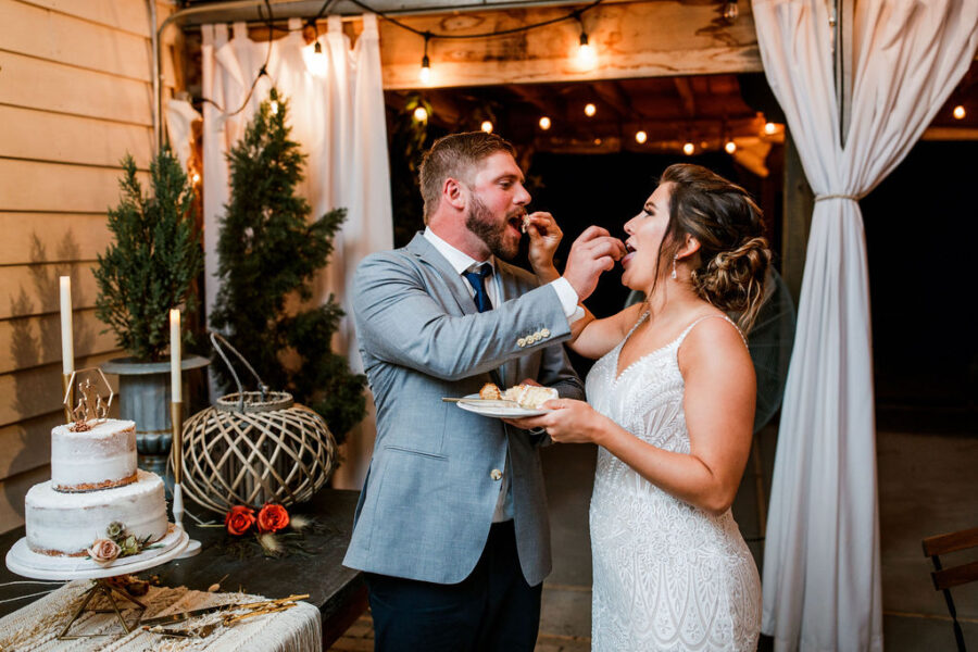Bride and groom cutting wedding cake | Nashville Bride Guide