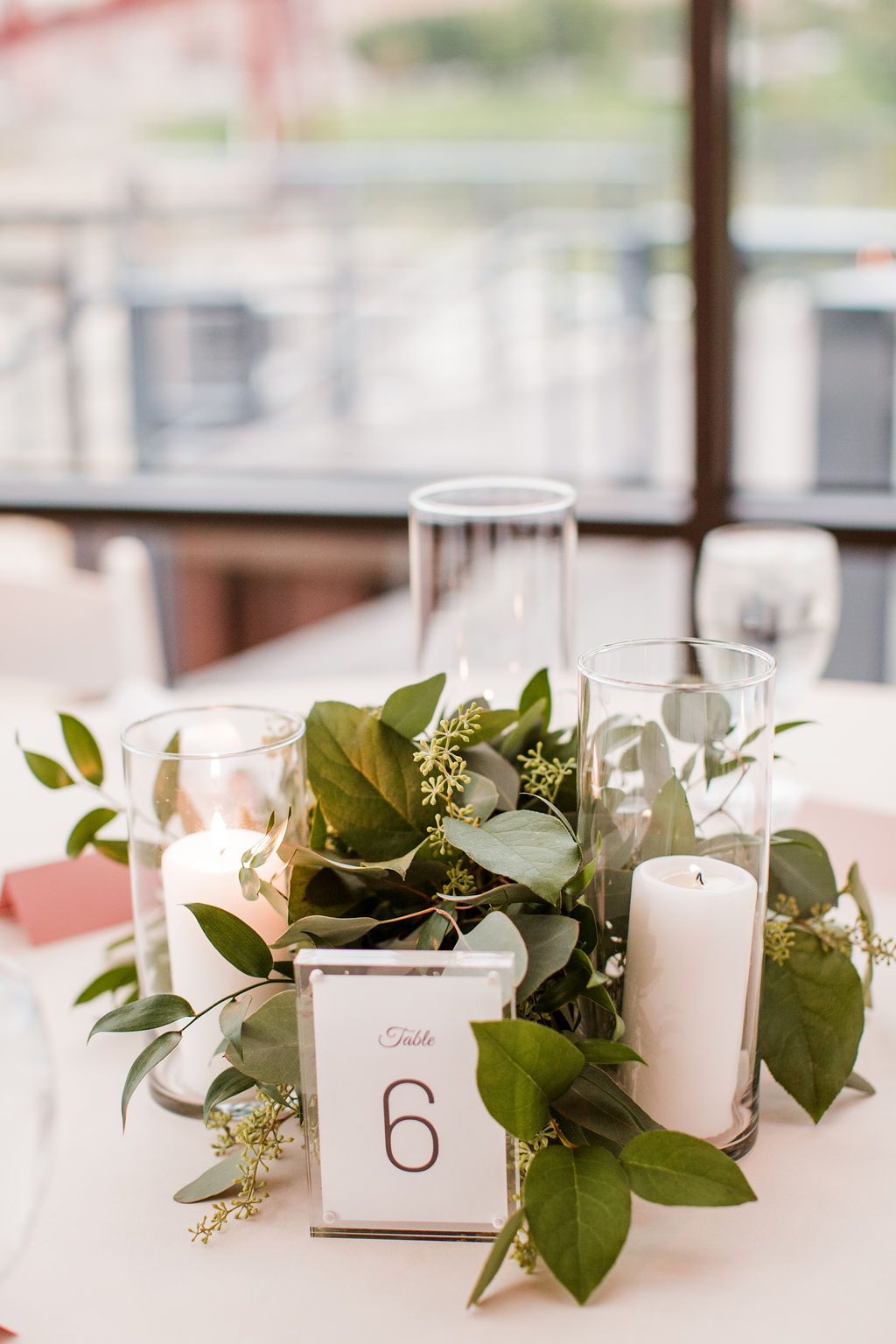 Greenery wedding centerpieces with candles | Nashville Bride Guide