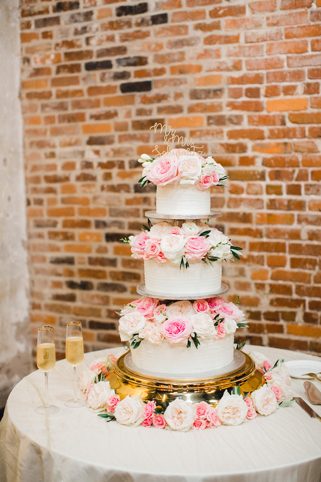 Pink and white floral wedding cake design