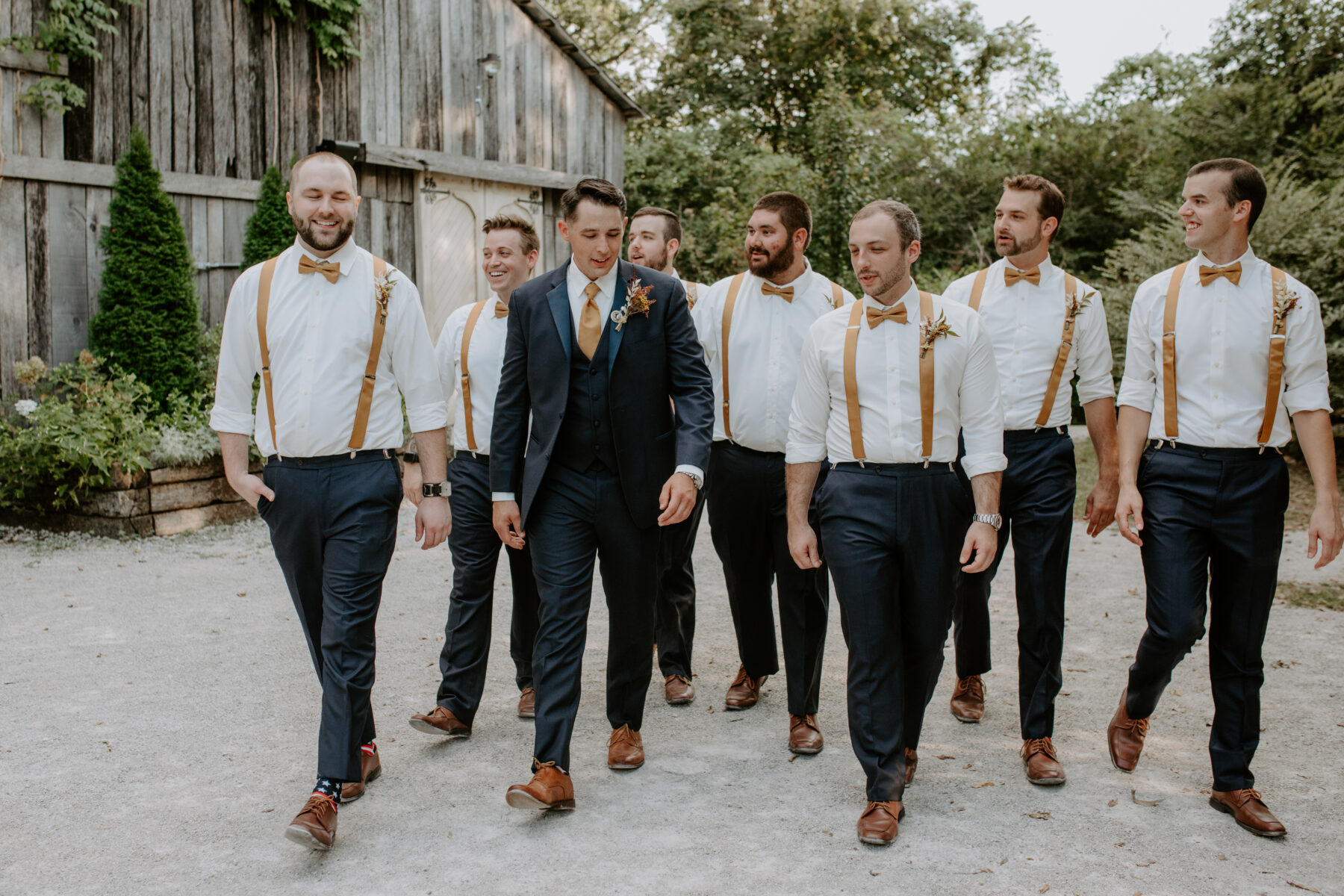 Groom and groomsmen attire from Tuxedo Avenue