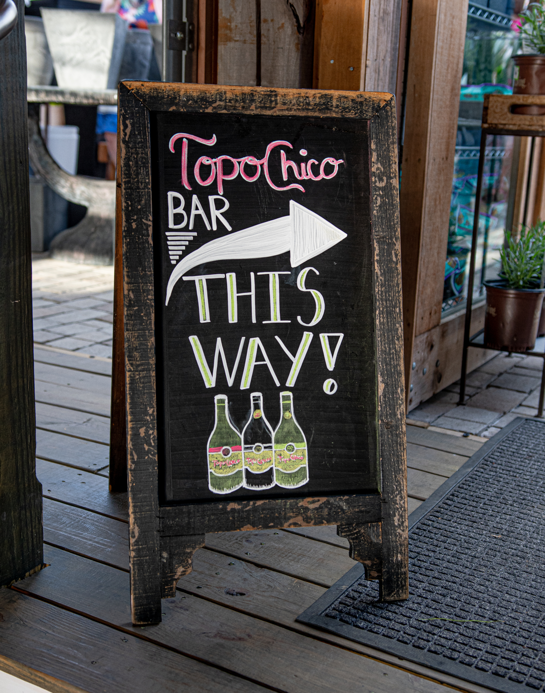 Topo Chico Bar sign