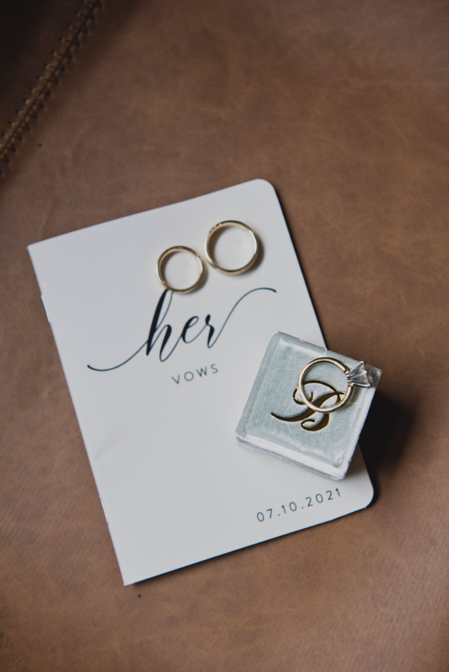 Wedding vow books and wedding rings