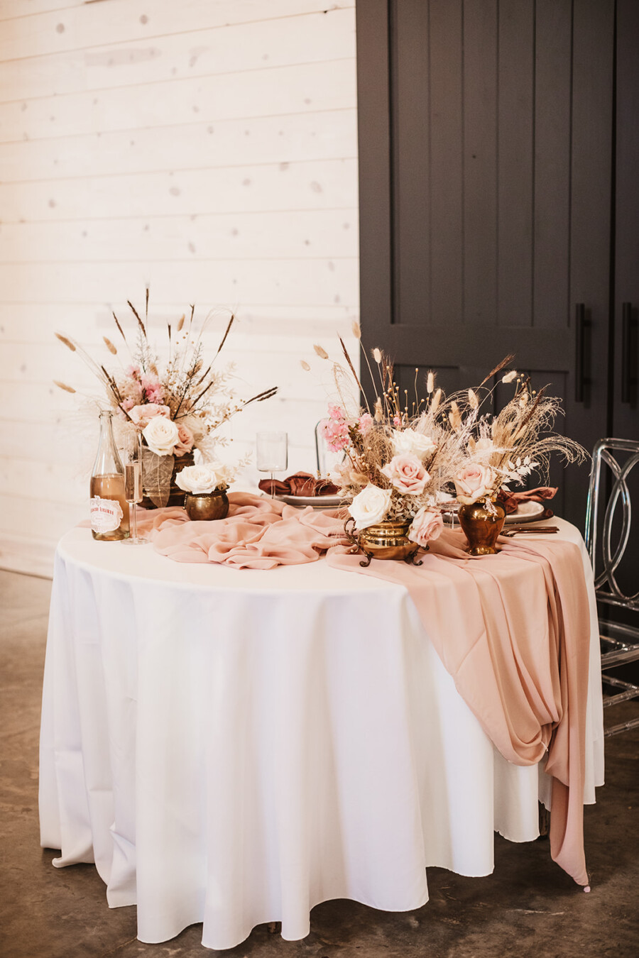 Rose gold bohemian wedding sweetheart table