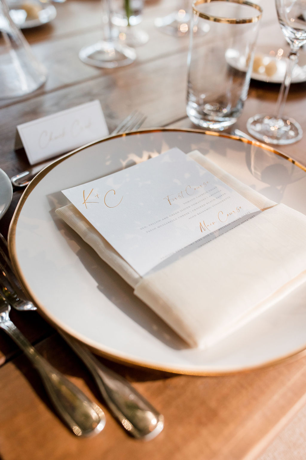 Ivory and gold wedding place setting
