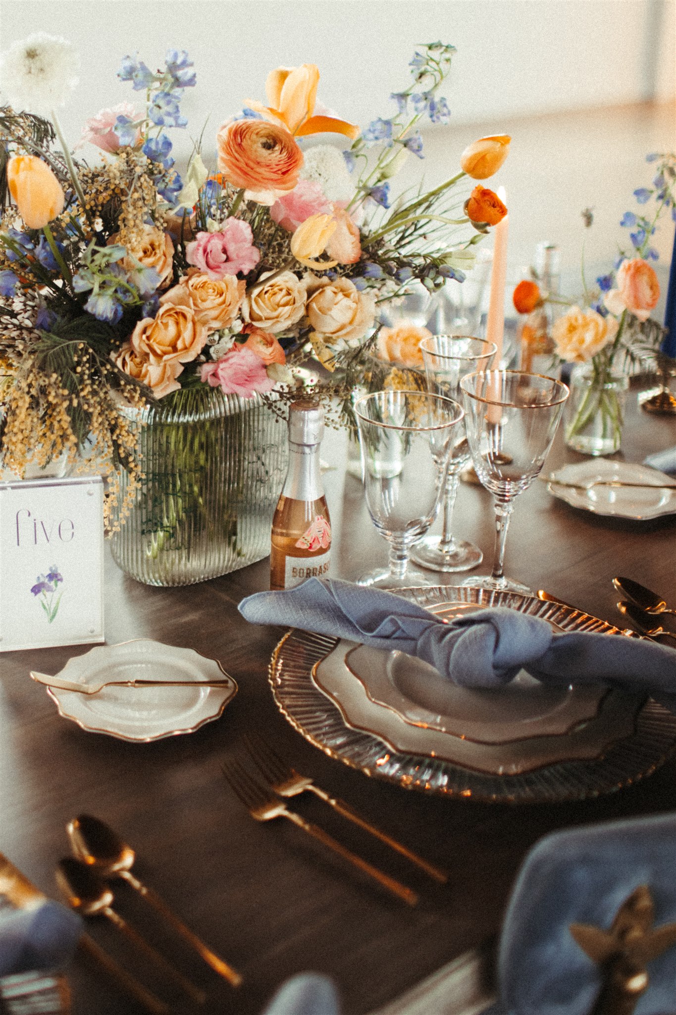 florals and glassware on table