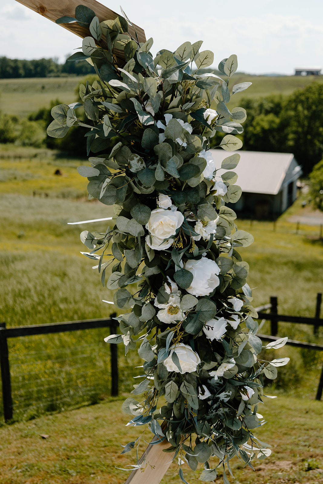 White and Greenery Wedding Ceremony Flowers